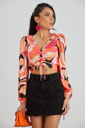 Vibrant Long Sleeve Crop Top in Coral Abstract Design